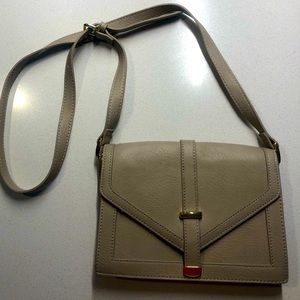 Nude cross body bag
